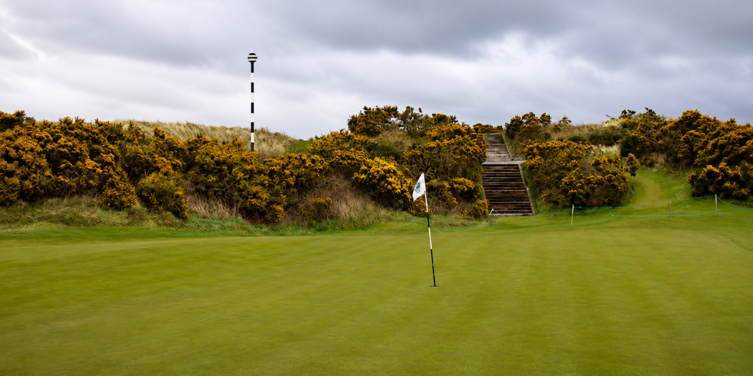 Hole 13, Royal County Down. The pole is where you aim on your approach.
